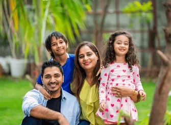 Happy family with solar panels